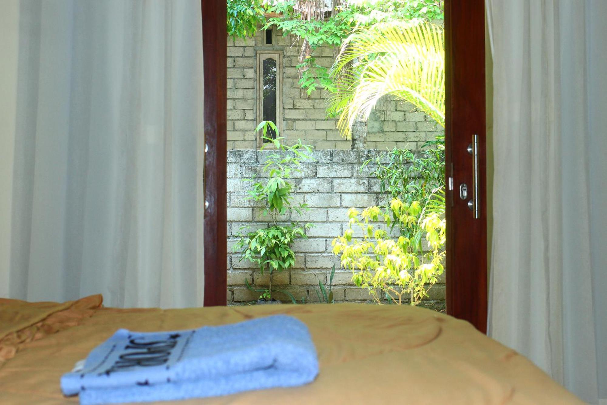 Three V Homestay Kuta  Экстерьер фото
